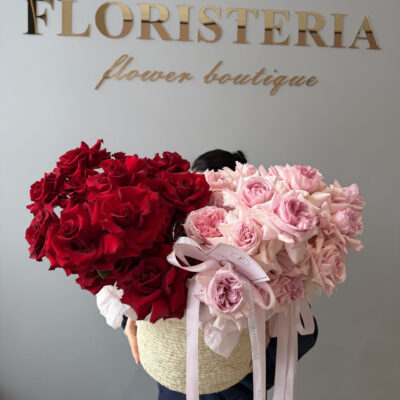 Композиція з 51 троянди в плетеному кошику