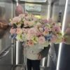 Композиція в коробці в розмірі XXL з міксу пастельних квітів